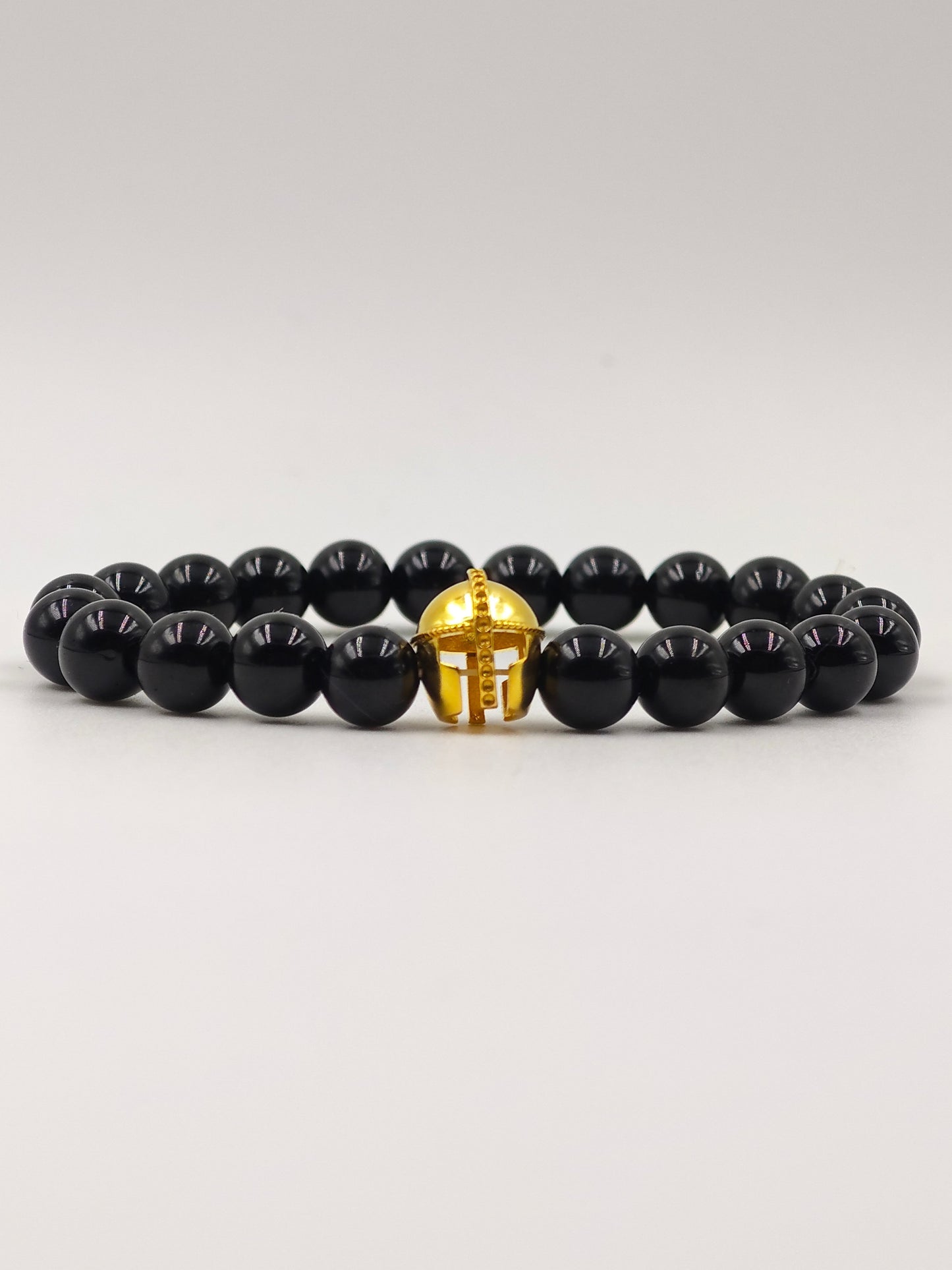 BLACK OBSIDIAN BEADED BAND WITH SILVER WARRIOR CAP GOLD PLATTED