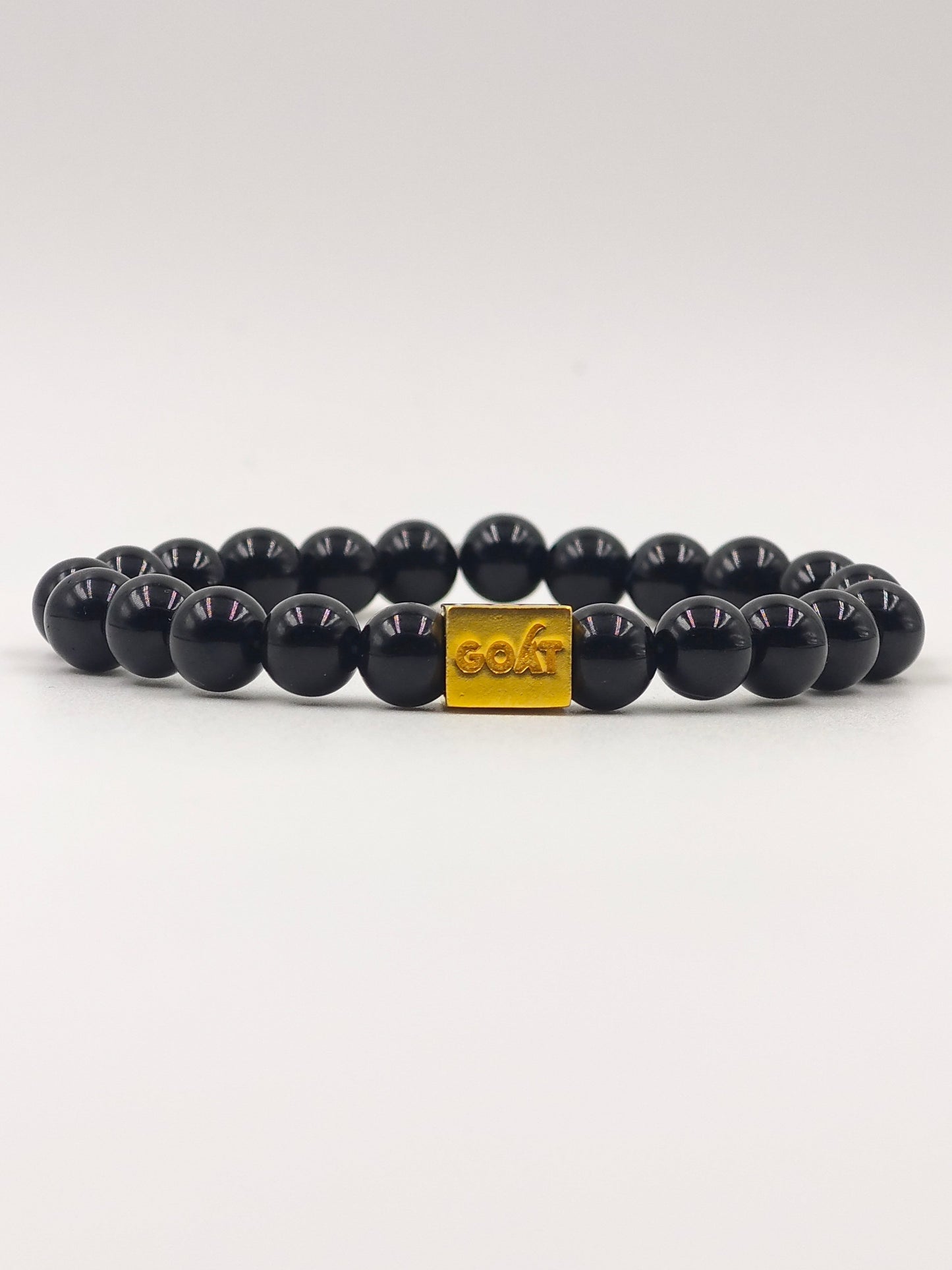 BLACK OBSIDIAN BEADED BAND WITH G.O.A.T SIGNATURE GOLD PLATTED SILVER CLASP