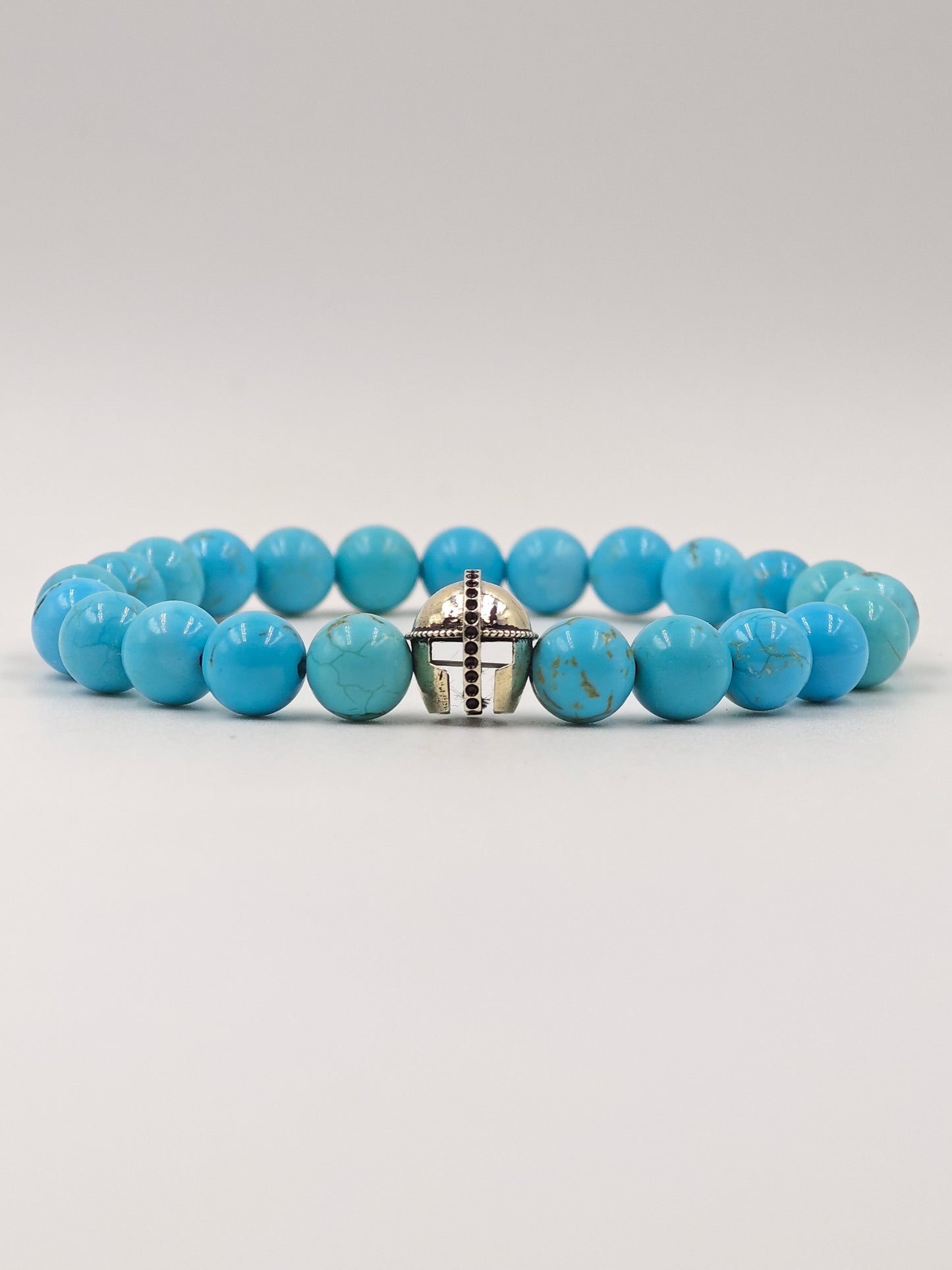TURQUOISE STONE BEADED BAND WITH SILVER WARRIOR CAP CLASP