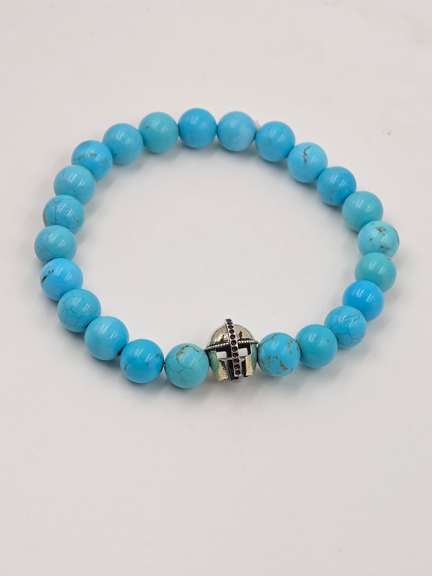 TURQUOISE STONE BEADED BAND WITH SILVER WARRIOR CAP CLASP
