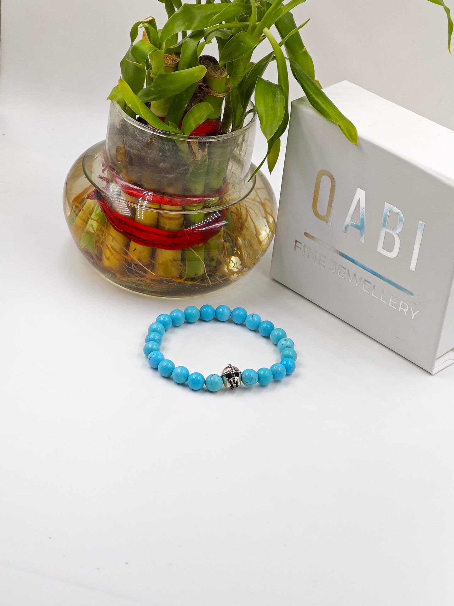 TURQUOISE STONE BEADED BAND WITH SILVER WARRIOR CAP CLASP