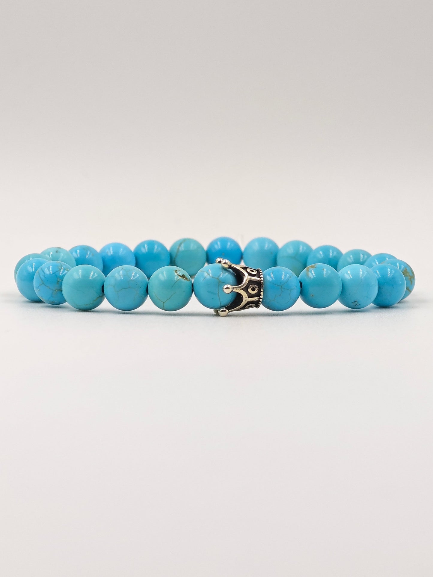 TURQUOISE STONE BEADED BAND WITH SILVER CROWN CLASP