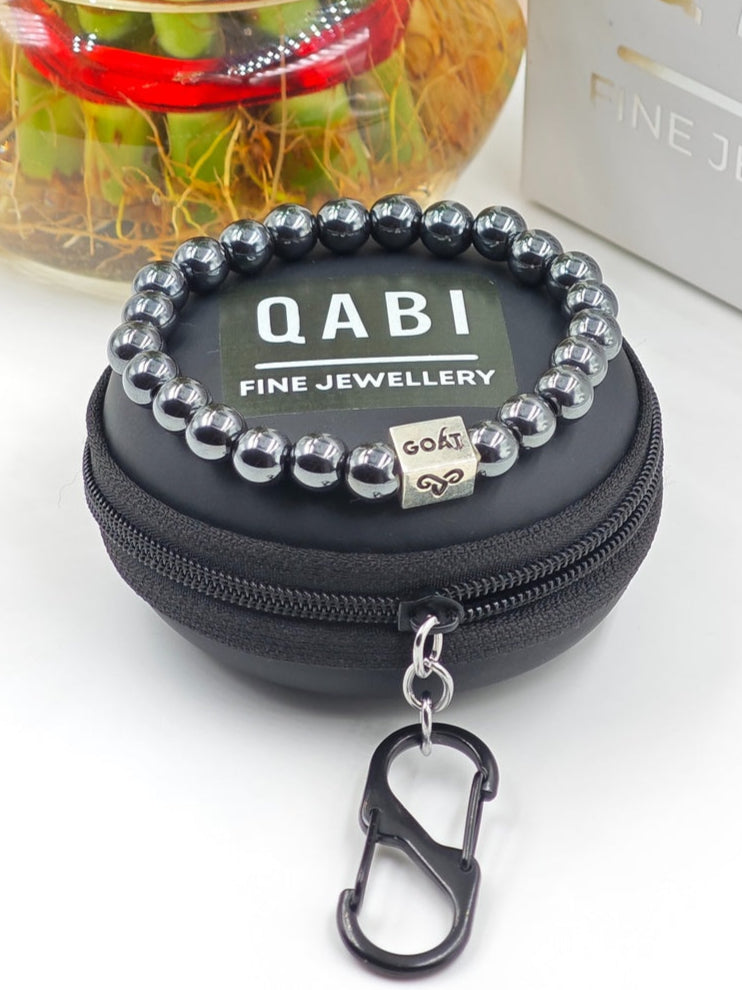 HEMATITE BEADED BAND WITH SILVER G.O.A.T SIGNATURE RECTANGLE DRUM CLASP