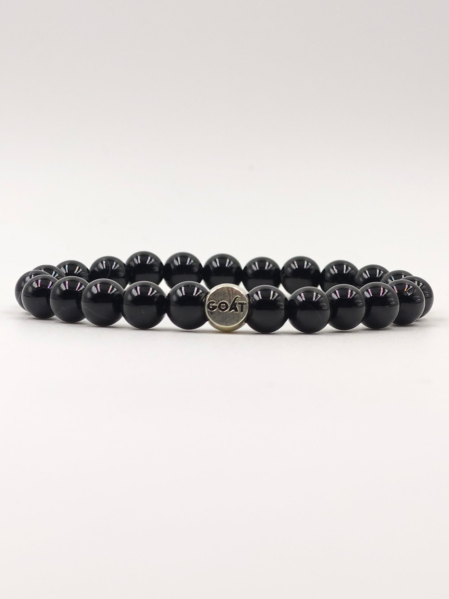 BLACK OBSIDIAN BEADED BAND WITH SILVER G.O.A.T SIGNATURE ROUND DRUM CLASP