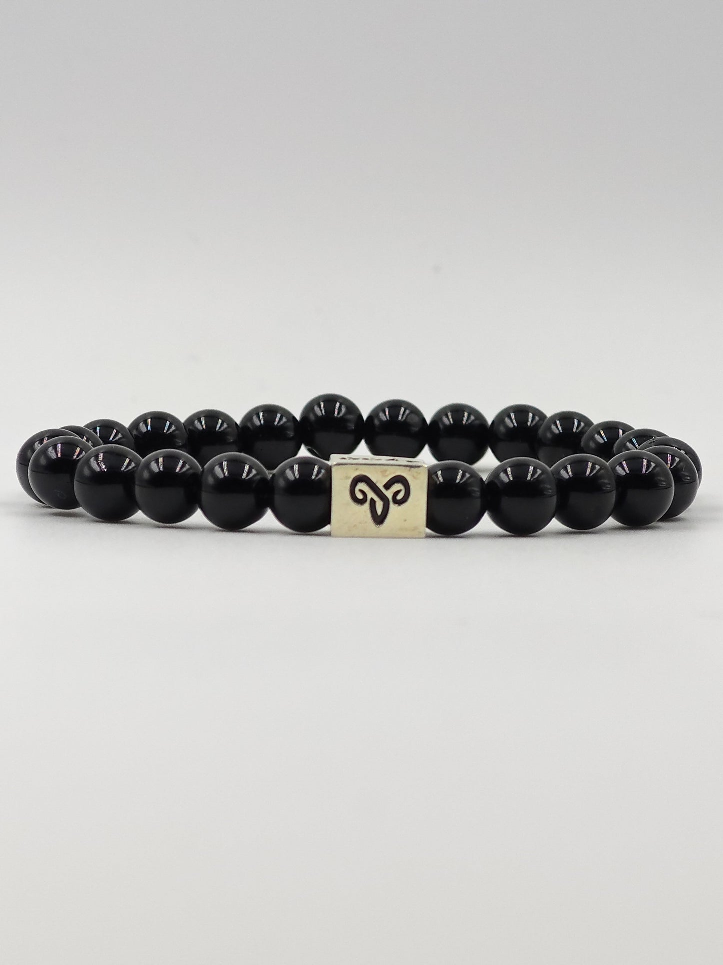 BLACK OBSIDIAN BEADED BAND WITH SILVER G.O.A.T SIGNATURE RECTANGLE DRUM CLASP
