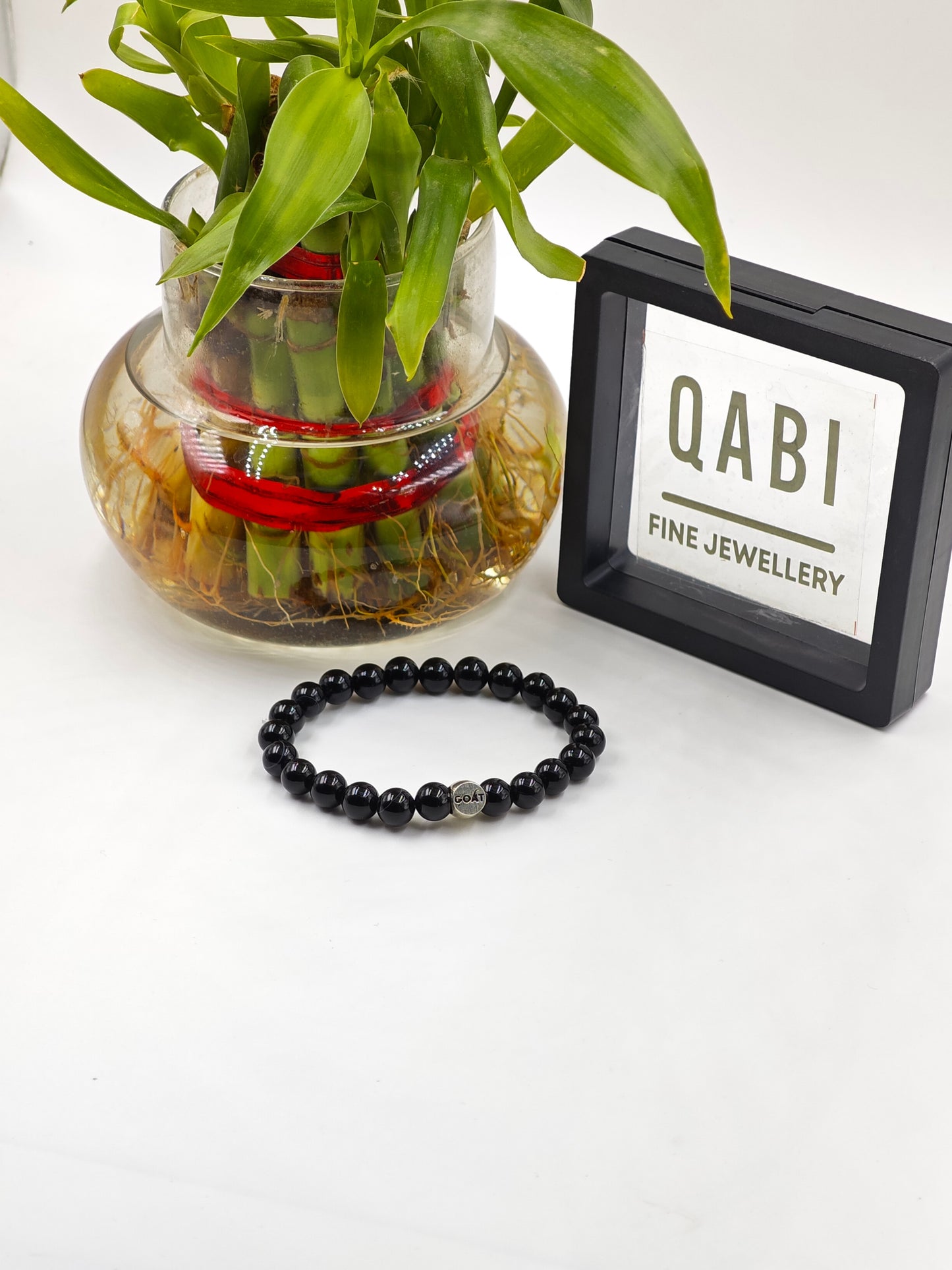 BLACK OBSIDIAN BEADED BAND WITH SILVER G.O.A.T SIGNATURE ROUND DRUM CLASP