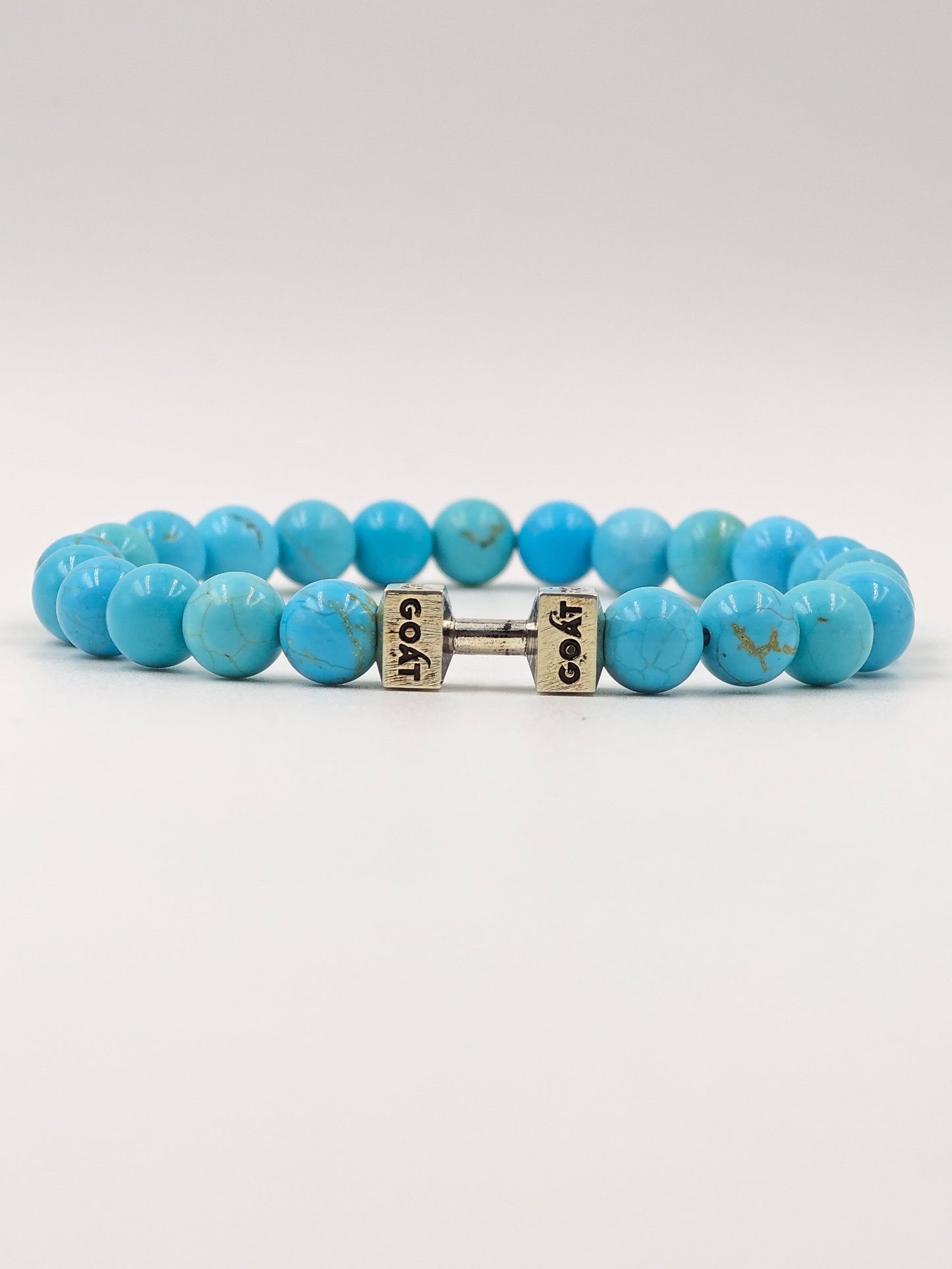 TURQUOISE STONE BEADED BAND WITH SILVER G.O.A.T SIGNATURE DUMBLE CLASP