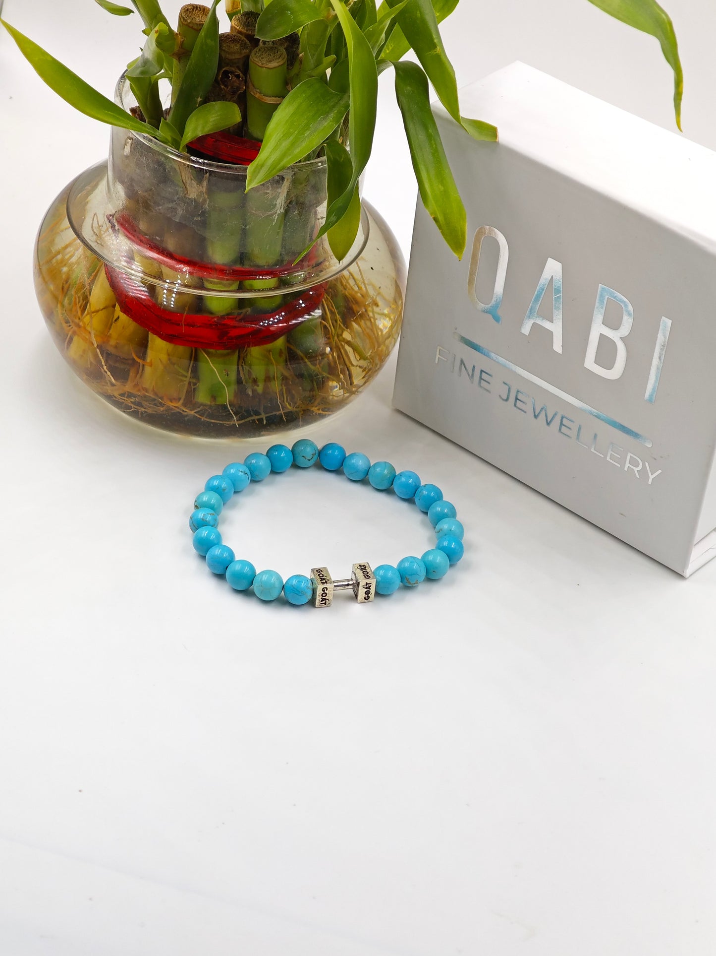 TURQUOISE STONE BEADED BAND WITH SILVER G.O.A.T SIGNATURE DUMBLE CLASP