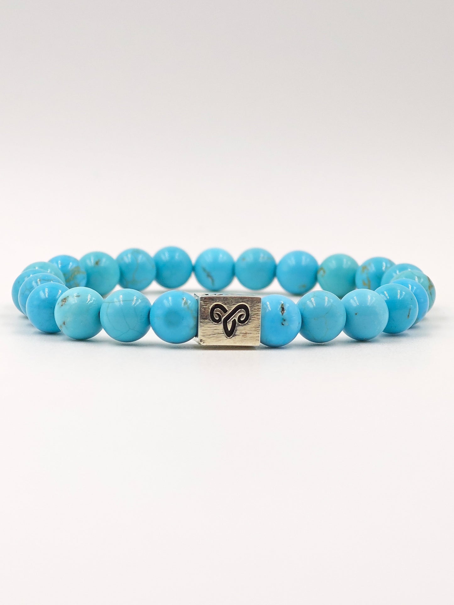 TURQUOISE STONE BEADED BAND WITH SILVER G.O.A.T SIGNATURE RECTANGLE DRUM CLASP