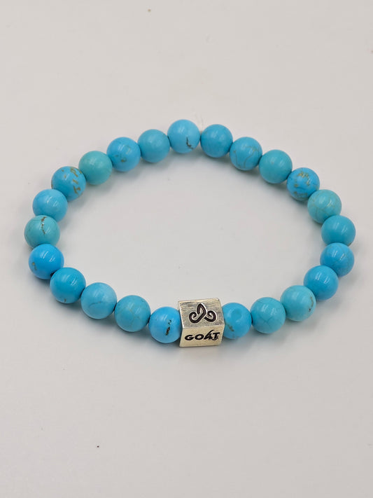 TURQUOISE STONE BEADED BAND WITH SILVER G.O.A.T SIGNATURE RECTANGLE DRUM CLASP