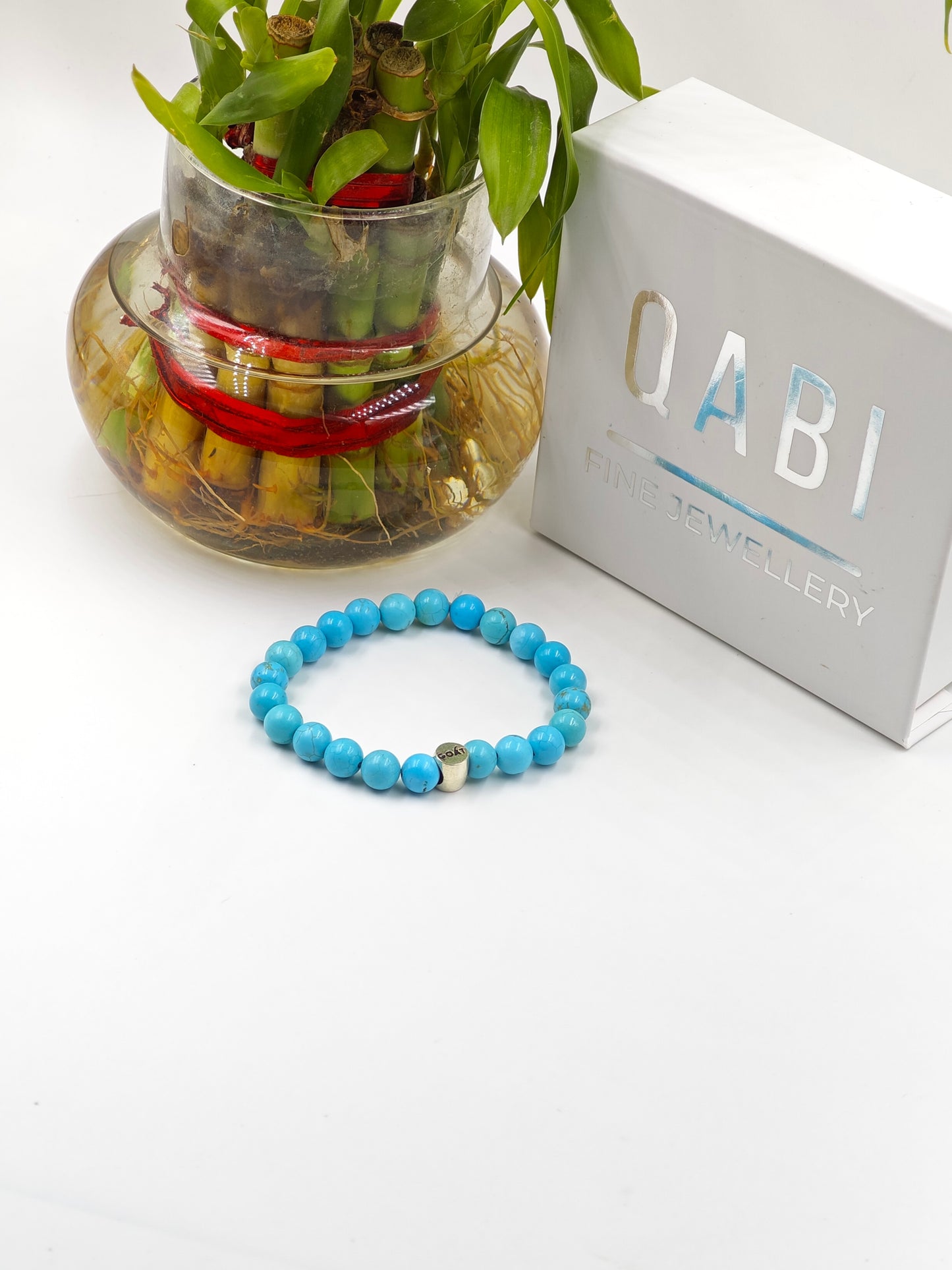 TURQUOISE STONE BEADED BAND WITH SILVER G.O.A.T SIGNATURE ROAUND DRUM CLASP