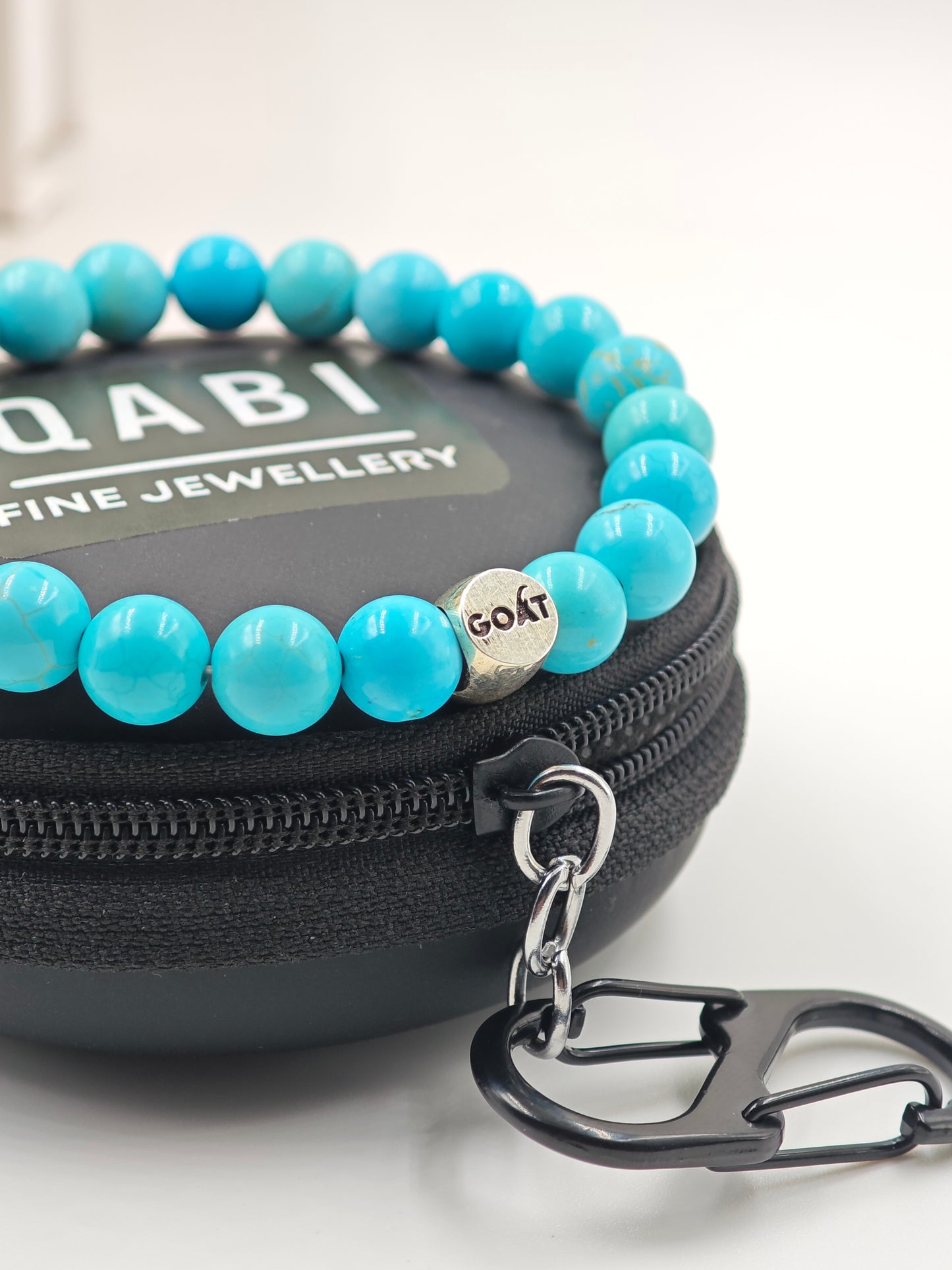 TURQUOISE STONE BEADED BAND WITH SILVER G.O.A.T SIGNATURE ROAUND DRUM CLASP
