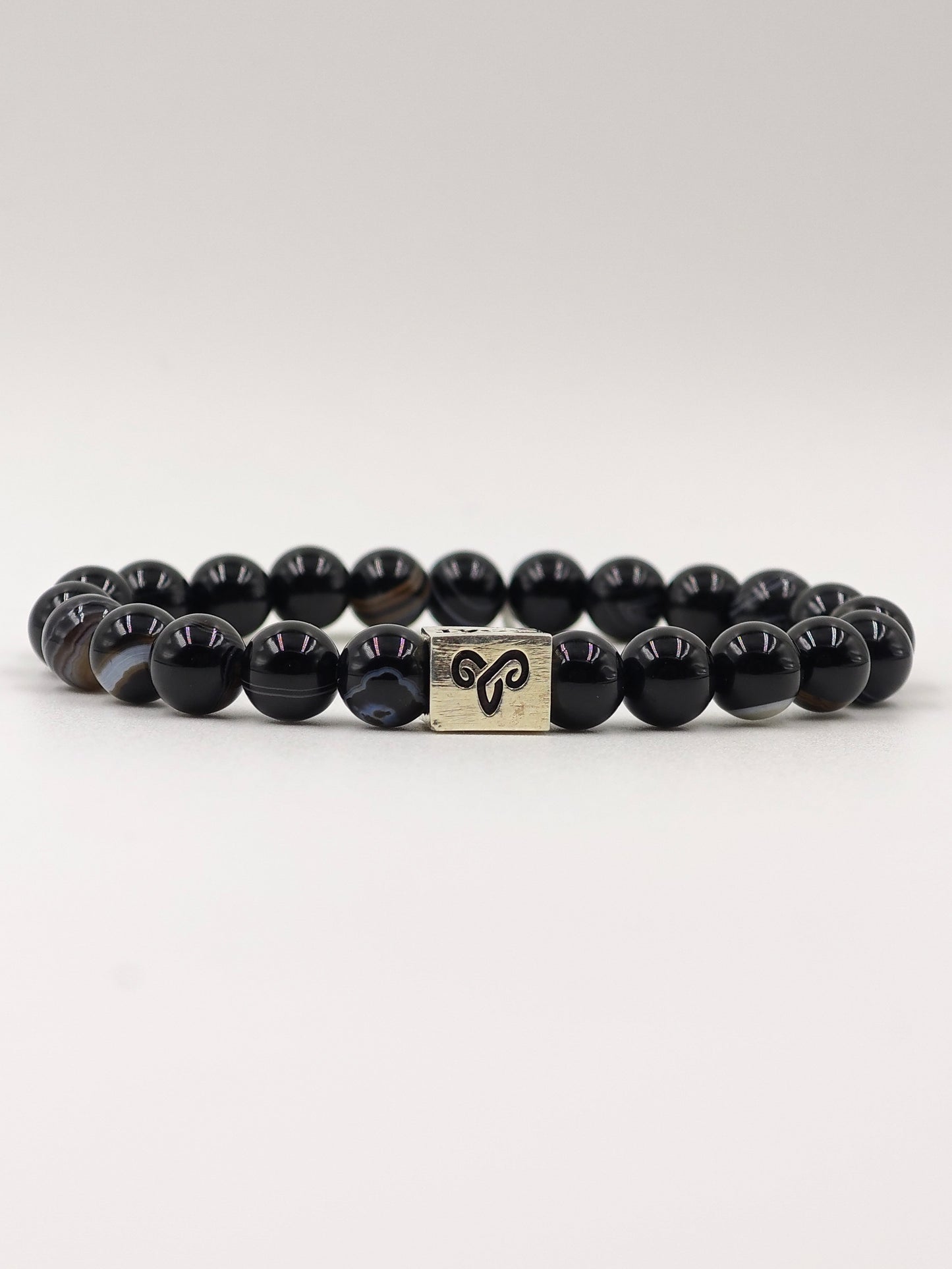 BLACK OBSIDIAN BEADED BAND WITH SILVER G.O.A.T SIGNATURE RECTANGLE DRUM CLASP