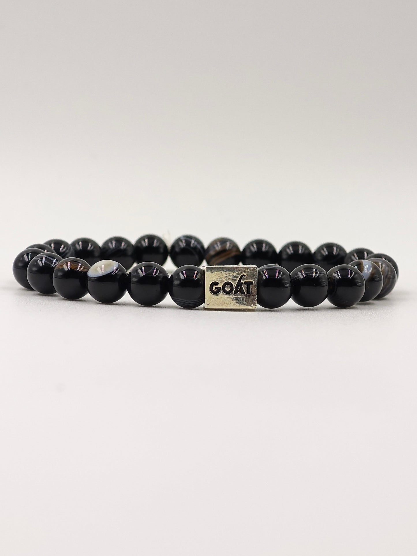 BLACK OBSIDIAN BEADED BAND WITH SILVER G.O.A.T SIGNATURE RECTANGLE DRUM CLASP