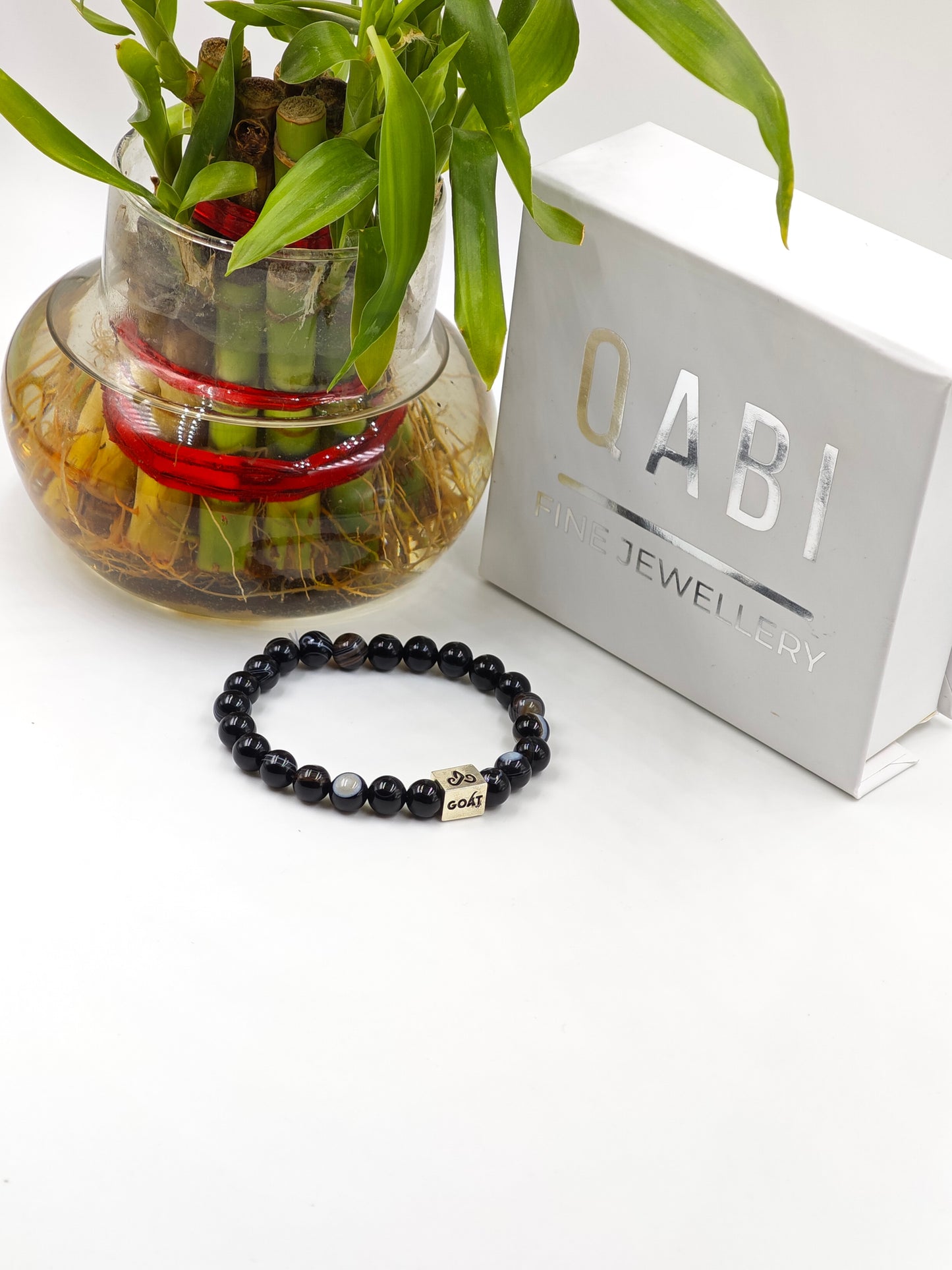 BLACK OBSIDIAN BEADED BAND WITH SILVER G.O.A.T SIGNATURE RECTANGLE DRUM CLASP